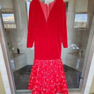 Red velvet evening gown with rose petal bottom train
